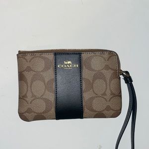 Black and brown coach wristlet